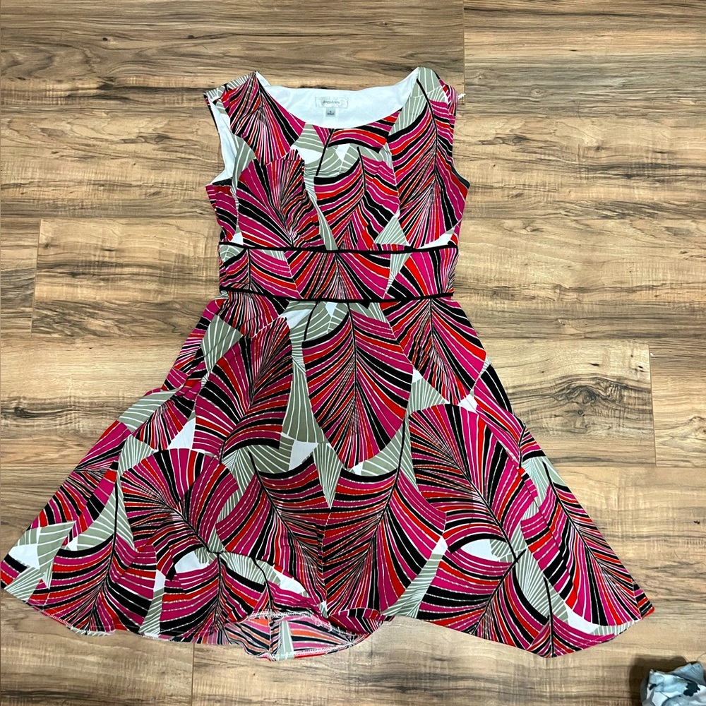 A cute, flattering, knee length, red patterned dress